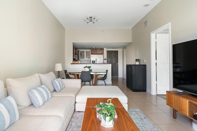 living room with light tile patterned floors