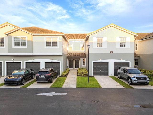 view of front of property featuring a garage