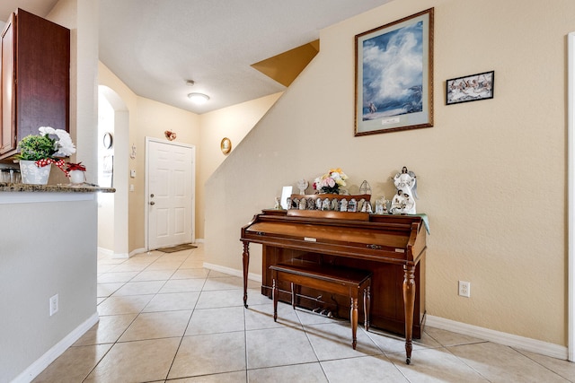 foyer with light tile patterned flooring