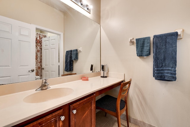 bathroom with vanity and tile patterned floors