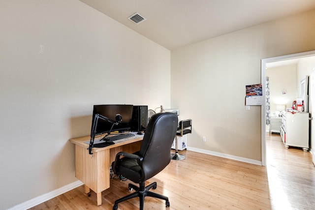 office featuring light hardwood / wood-style flooring