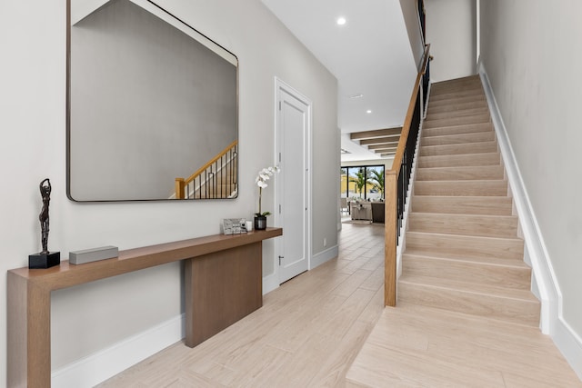 staircase featuring hardwood / wood-style flooring