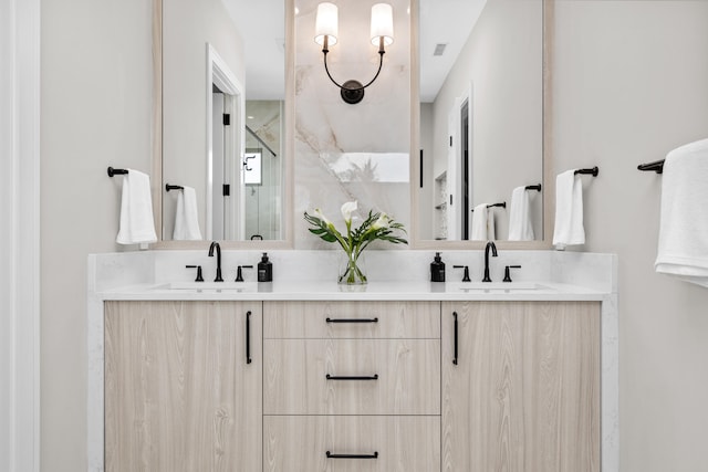 bathroom featuring vanity and walk in shower