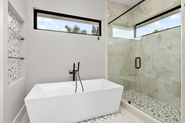 bathroom with independent shower and bath