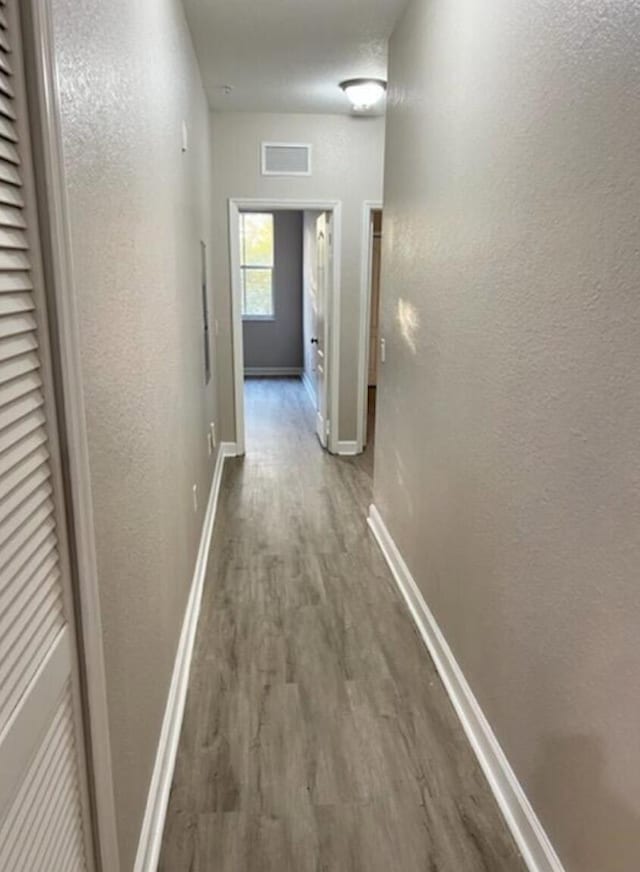 hall featuring hardwood / wood-style floors