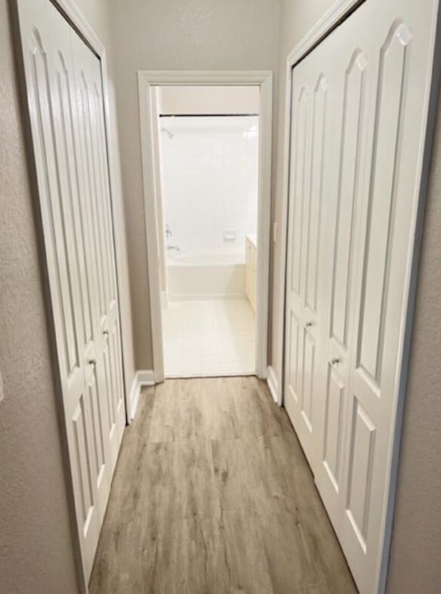 hall featuring light hardwood / wood-style floors