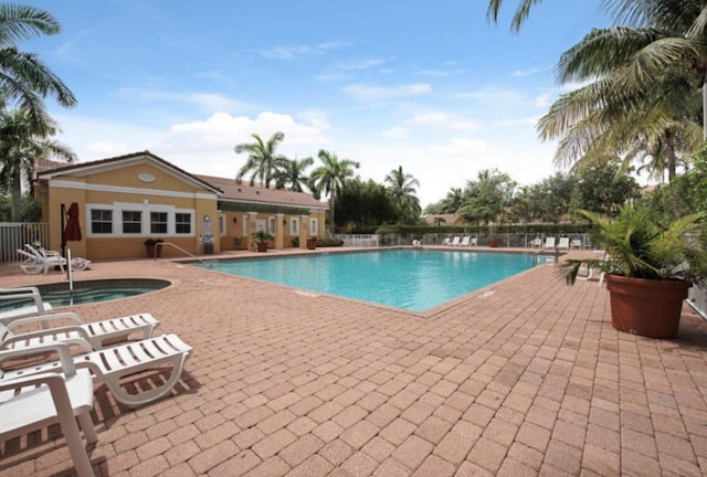 view of swimming pool featuring a patio area