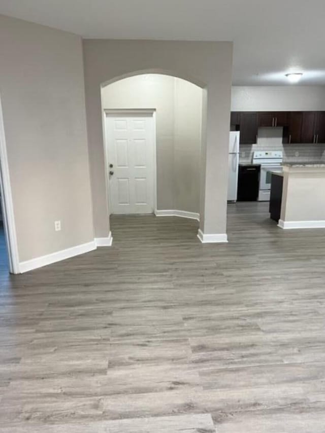 unfurnished living room with light hardwood / wood-style floors