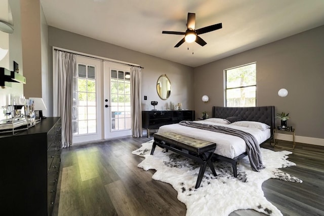 bedroom featuring ceiling fan, dark hardwood / wood-style flooring, access to outside, and french doors