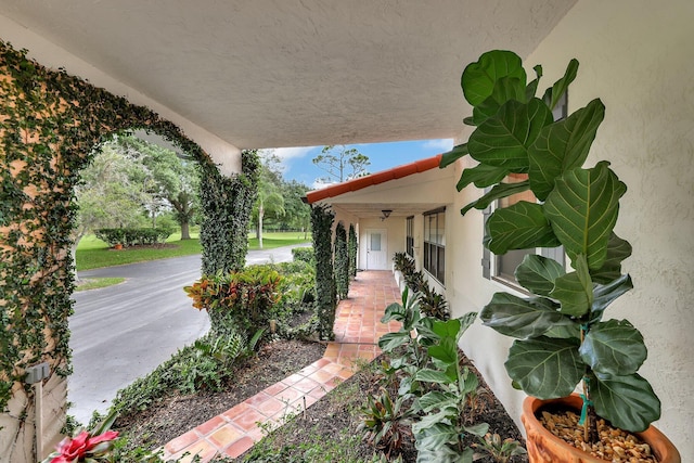 view of patio featuring a porch