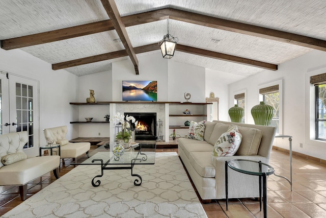 tiled living room featuring french doors and lofted ceiling with beams