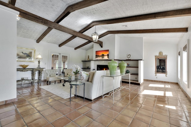 living room with tile patterned flooring, vaulted ceiling with beams, and french doors