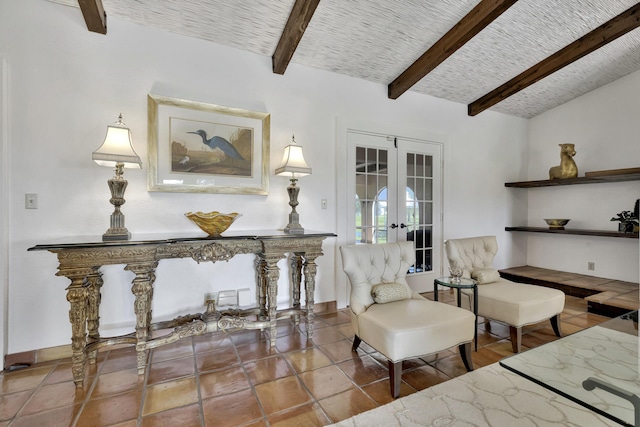 living area with french doors and beamed ceiling