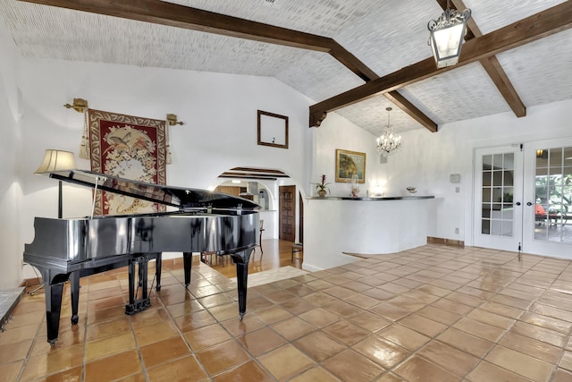 miscellaneous room featuring tile patterned flooring, vaulted ceiling with beams, an inviting chandelier, and french doors