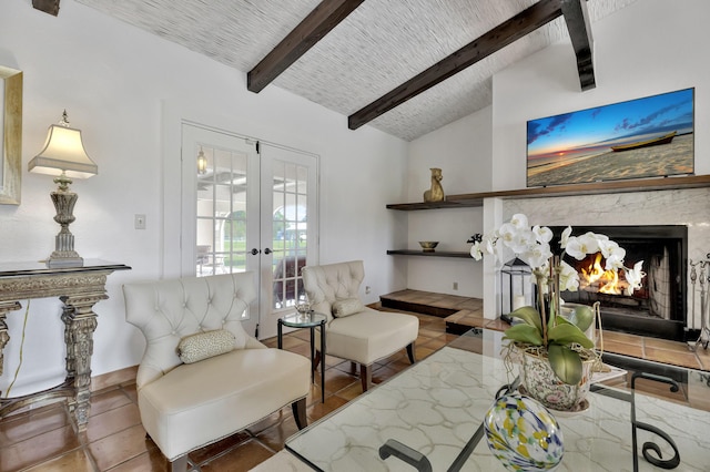 living room featuring french doors, vaulted ceiling with beams, and a premium fireplace