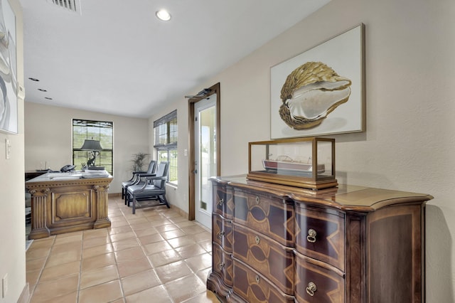 interior space with light tile patterned floors