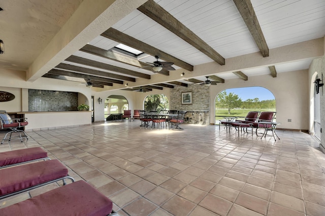 view of patio / terrace featuring ceiling fan