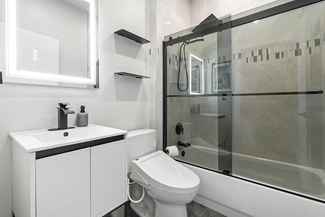 full bathroom with shower / bath combination with glass door, toilet, and vanity