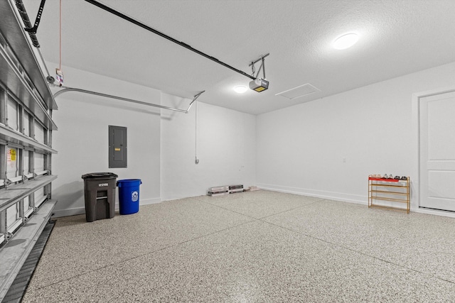 garage featuring electric panel and a garage door opener