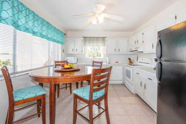 kitchen featuring ceiling fan, exhaust hood, white appliances, and white cabinetry