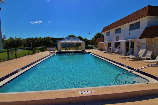 view of pool featuring a patio area and a gazebo