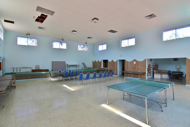 6289 Lear Dr Unit 301, Lake Worth, FL 33462 - game room with a towering ceiling and a wealth of natural light