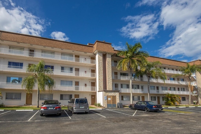 6289 Lear Dr Unit 301, Lake Worth, FL 33462 - view of property featuring uncovered parking