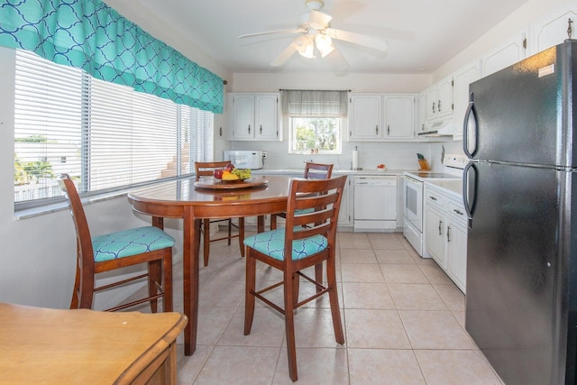 kitchen with ceiling fan, light tile patterned floors, white appliances, white cabinetry, and exhaust hood