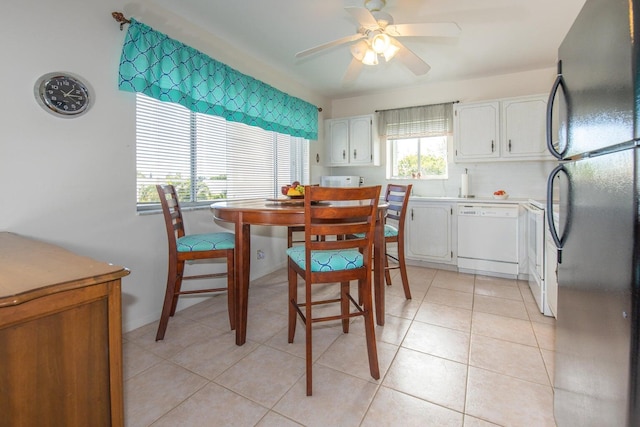 dining room featuring ceiling fan and light tile patterned floors