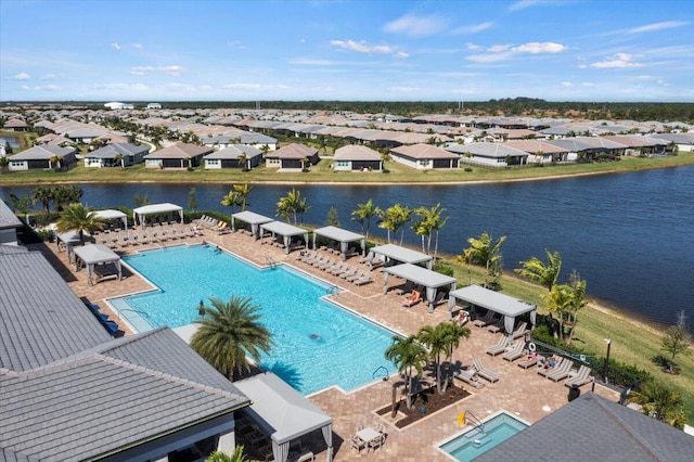 birds eye view of property featuring a water view