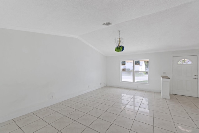 6009 Triphammer Rd, Lake Worth, FL 33463 - interior space featuring light tile patterned floors, crown molding, visible vents, baseboards, and vaulted ceiling