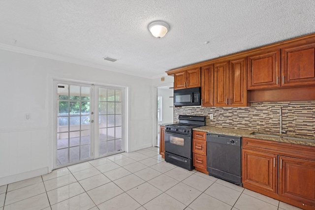 6009 Triphammer Rd, Lake Worth, FL 33463 - kitchen with tasteful backsplash, black appliances, crown molding, and a sink