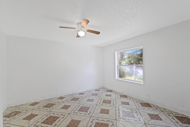 6009 Triphammer Rd, Lake Worth, FL 33463 - spare room with a textured ceiling and ceiling fan