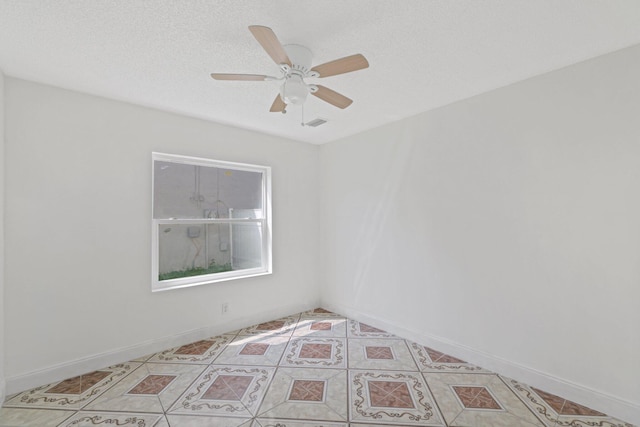 6009 Triphammer Rd, Lake Worth, FL 33463 - unfurnished room with baseboards, visible vents, light tile patterned floors, and a ceiling fan