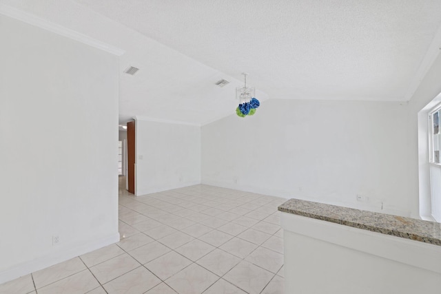 6009 Triphammer Rd, Lake Worth, FL 33463 - additional living space with light tile patterned flooring, visible vents, and lofted ceiling