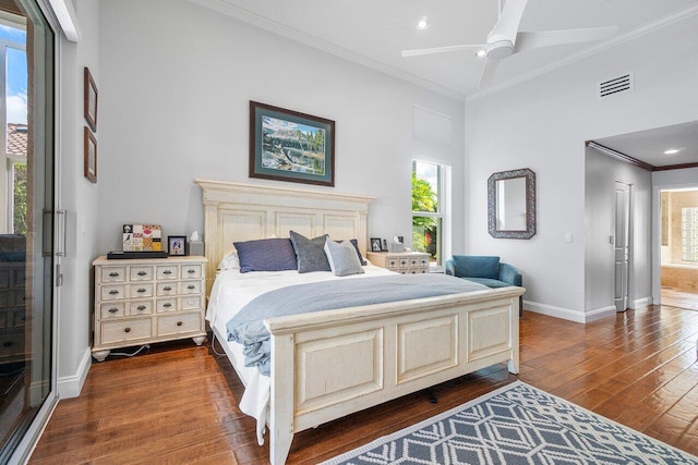 bedroom featuring ceiling fan, dark hardwood / wood-style floors, and crown molding