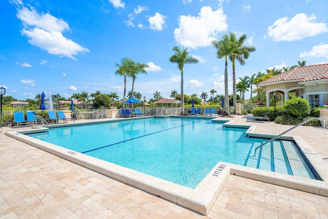 view of swimming pool featuring a patio area