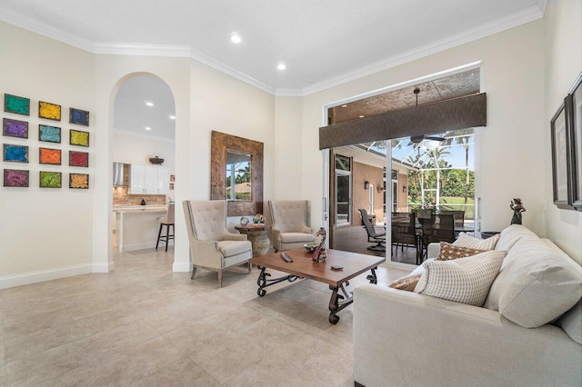 living room featuring ornamental molding and plenty of natural light