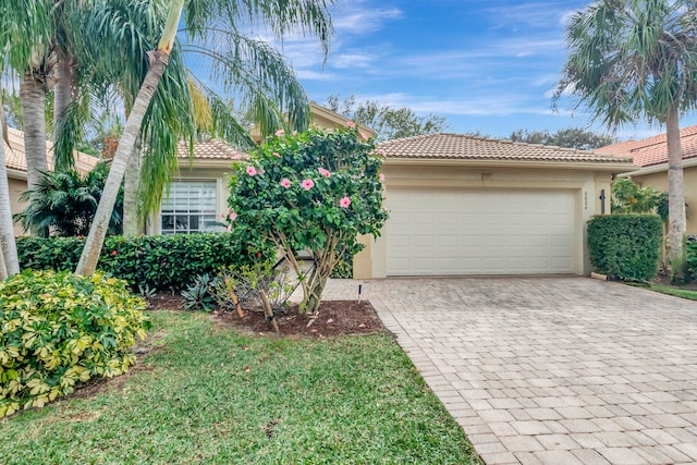 view of front of house with a garage