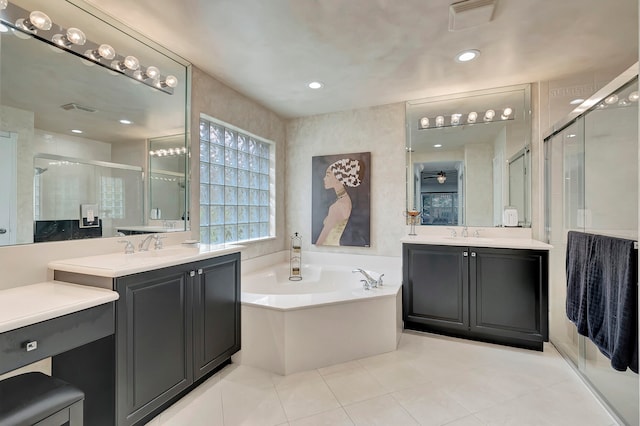 bathroom with vanity, independent shower and bath, and tile patterned flooring