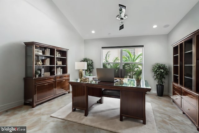 office area featuring vaulted ceiling