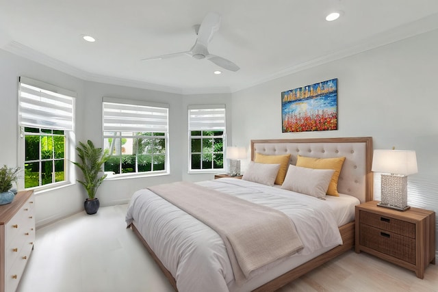 bedroom with ceiling fan and ornamental molding