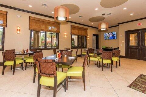 tiled dining area with crown molding