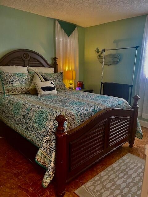 bedroom with a textured ceiling