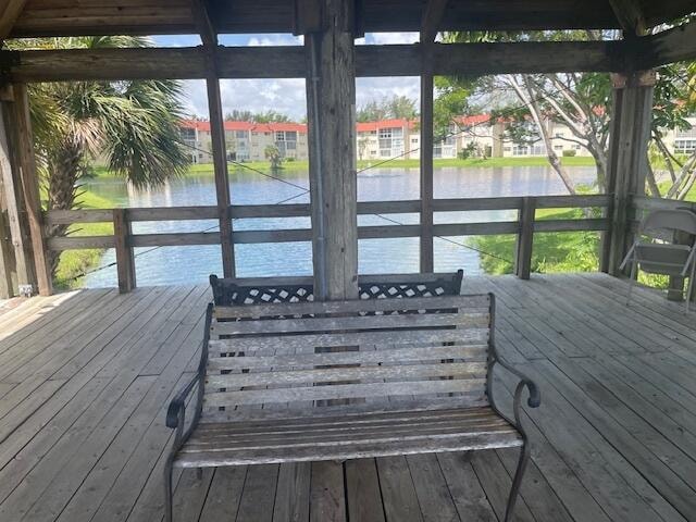 deck featuring a water view