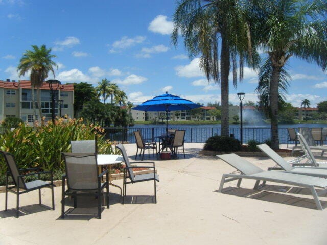 view of patio / terrace featuring a water view