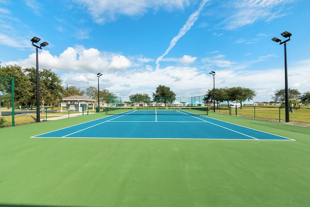 view of tennis court with basketball court