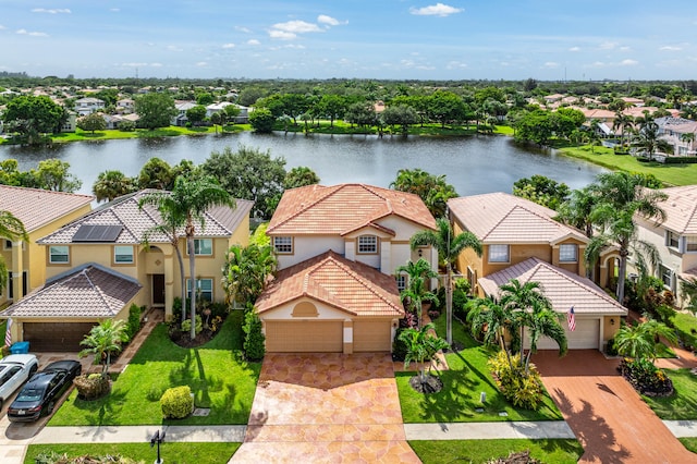 bird's eye view with a water view