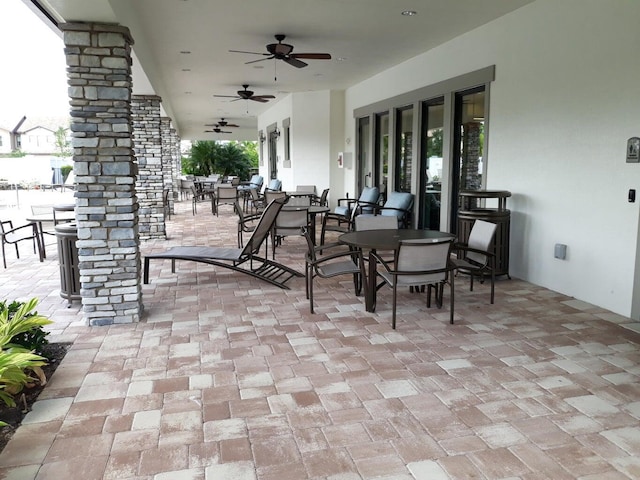 view of patio / terrace featuring ceiling fan