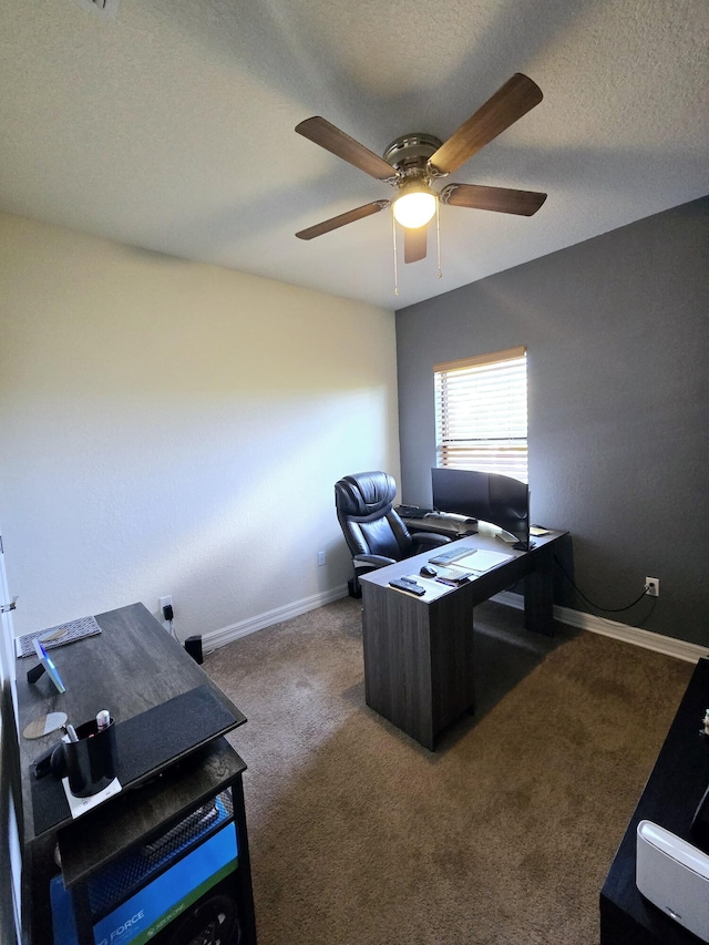 office space featuring a textured ceiling, carpet flooring, and ceiling fan